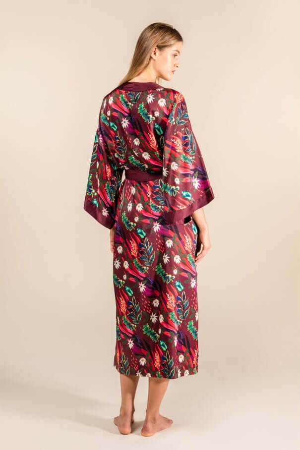 Hibiscus Silk Satin Robe with floral motifs, showcasing Japanese and Chinese artistry, in deep red symbolizing elegance and self-expression.