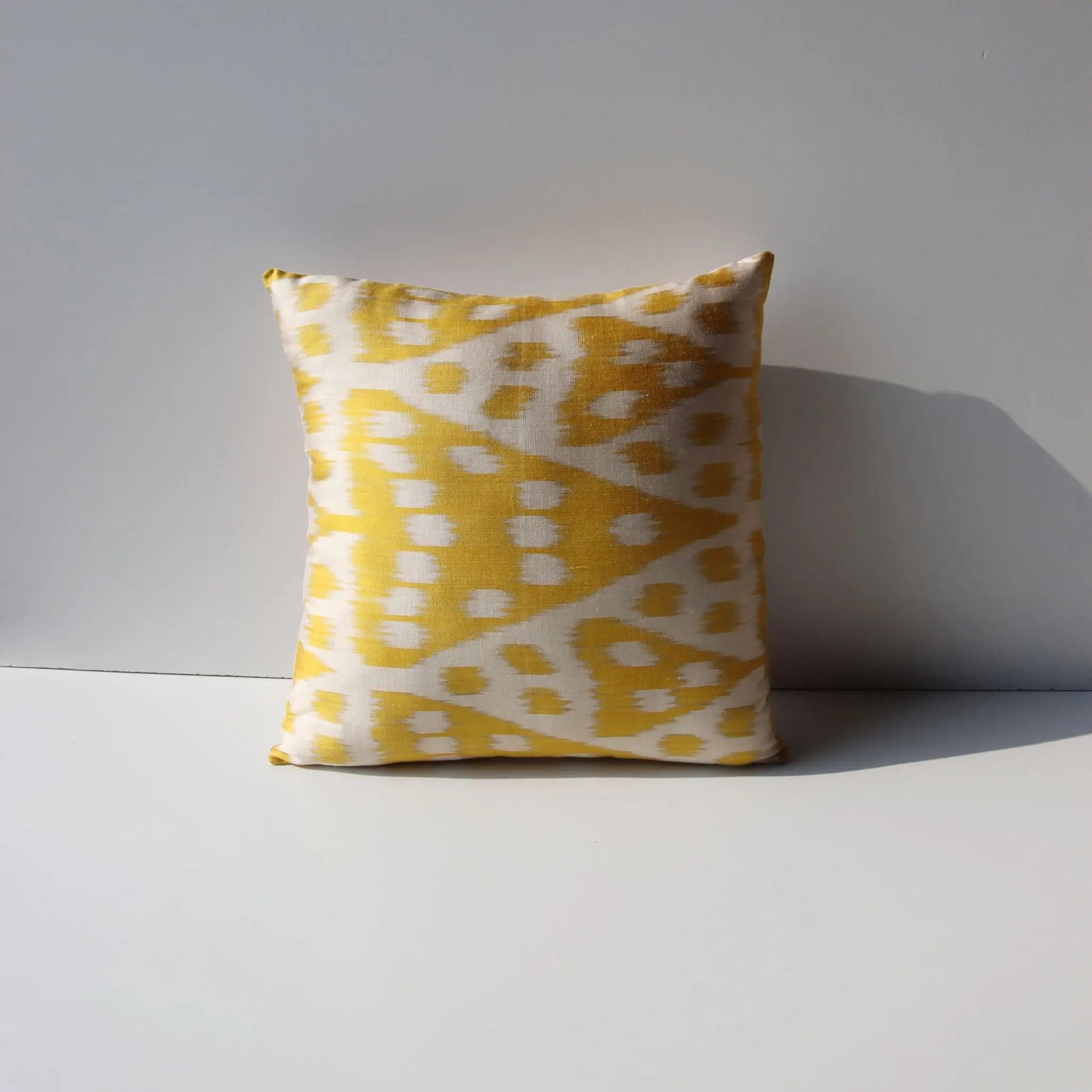 Ikat Print Pattern Cushion Gold Opening 1-1-2014