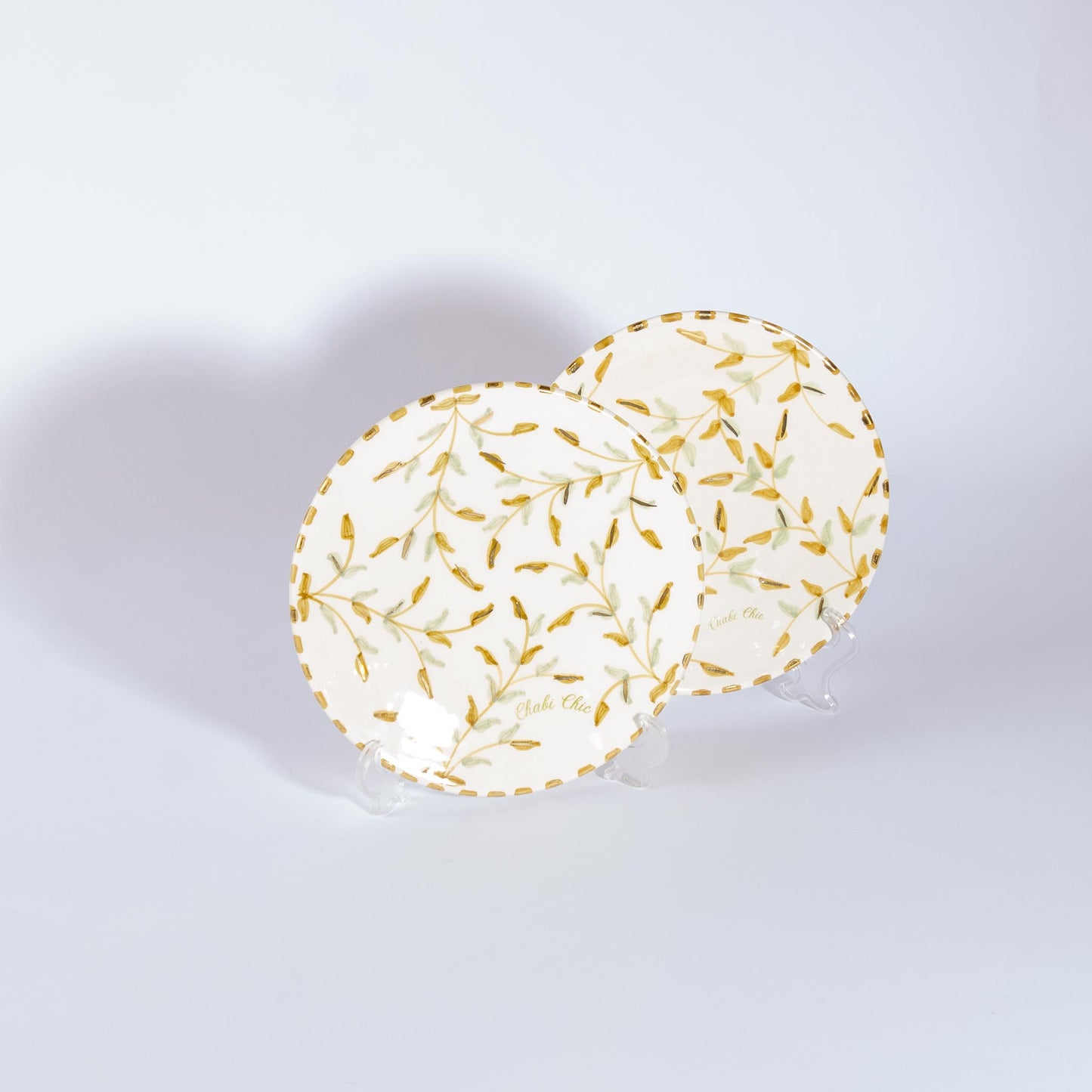 طقم أطباق سيراميك مزينة بأوراق ذهبية مكون من قطعتين