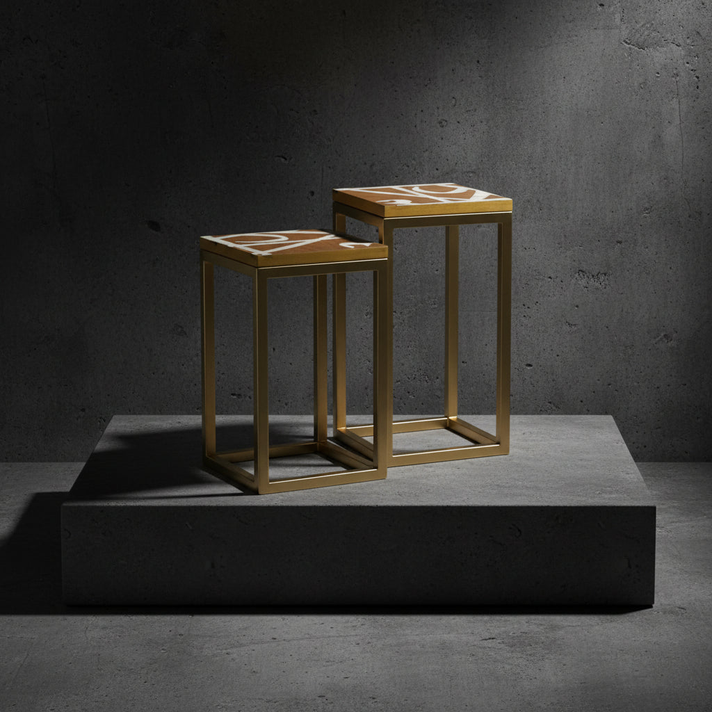 Nested Tables with Arabic calligraphy featuring a golden metal base and wooden top with mother of pearl inlay, elegant furniture piece.
