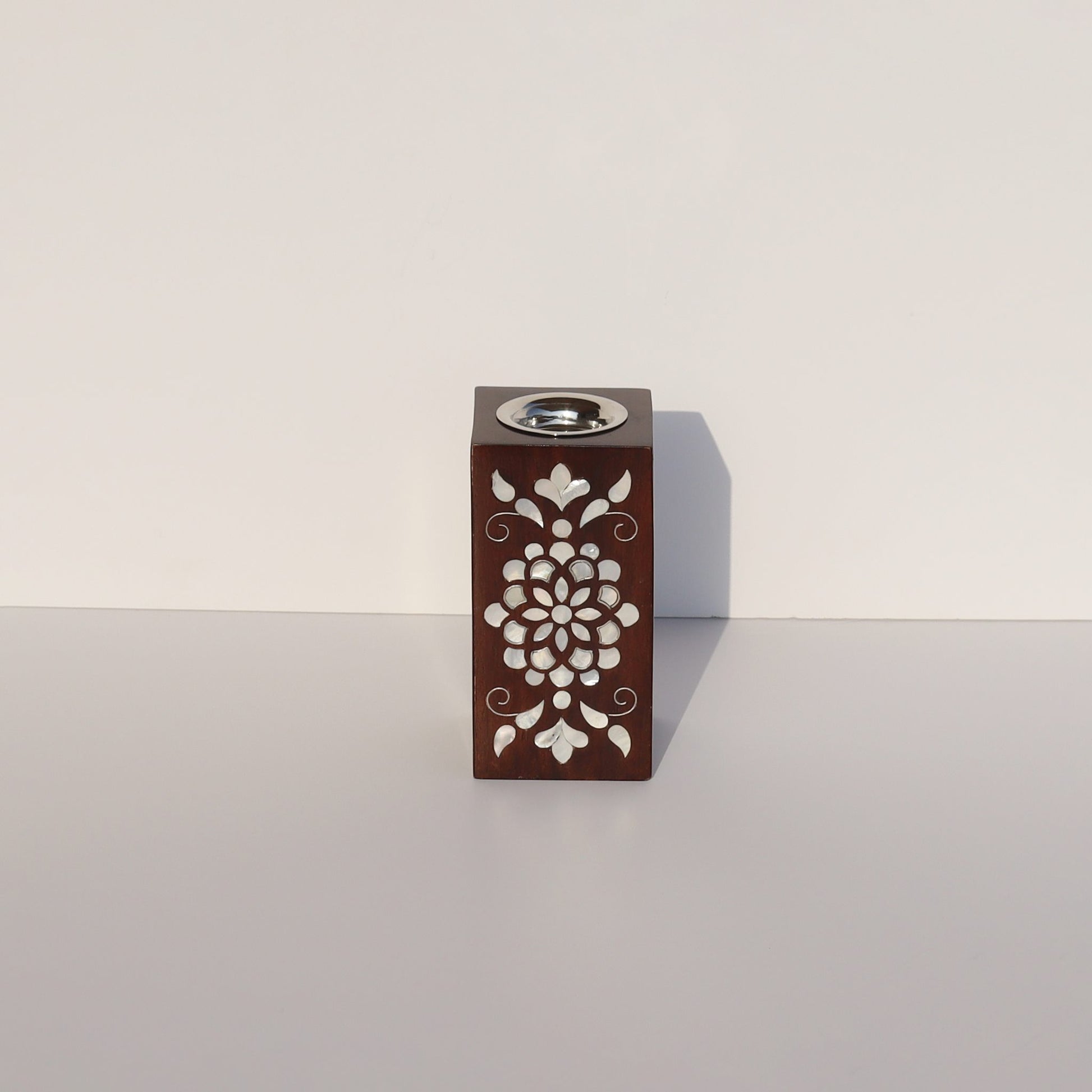 Mubkhar Sadaf Floral Engraved incense burner with mother of pearl inlay on wood, perfect for enhancing your home's traditional elegance.