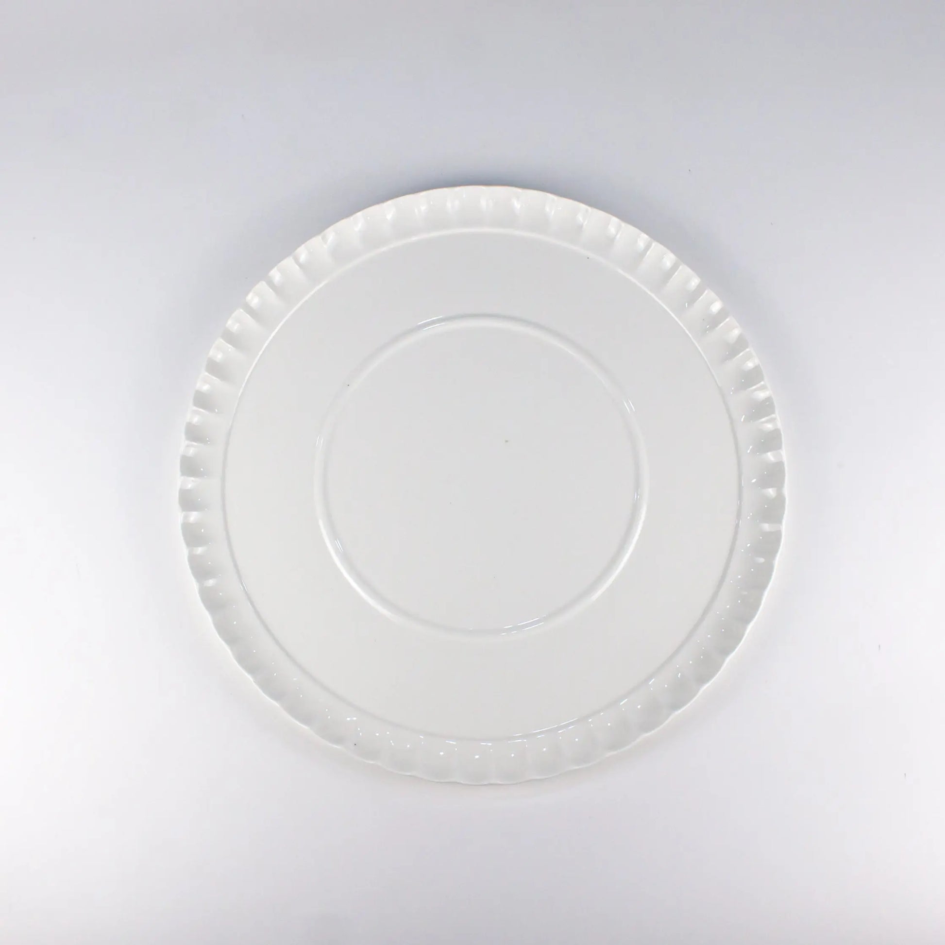 L Ripple Plate In Porcelain - Pieces SA